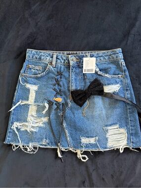 BDG Blue Distressed Denim Mini Skirt with Black Bow